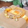 Gift box display of golden rutilated quartz and citrine bracelet