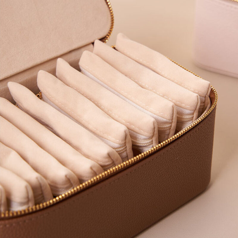 Detailed view of interior lining and bracelet holder inside the case