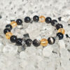 Main product image of silver obsidian bracelet with natural reflective beads