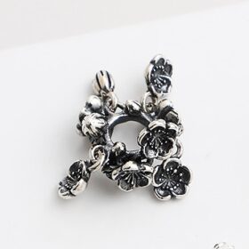 Oxidized Thai Silver Sakura Bead Cap Oxidized Thai silver sakura bead cap with five-petal flowers and a central opening