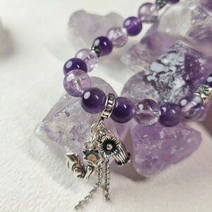 Close up of natural amethyst beads showing clarity and calming energy