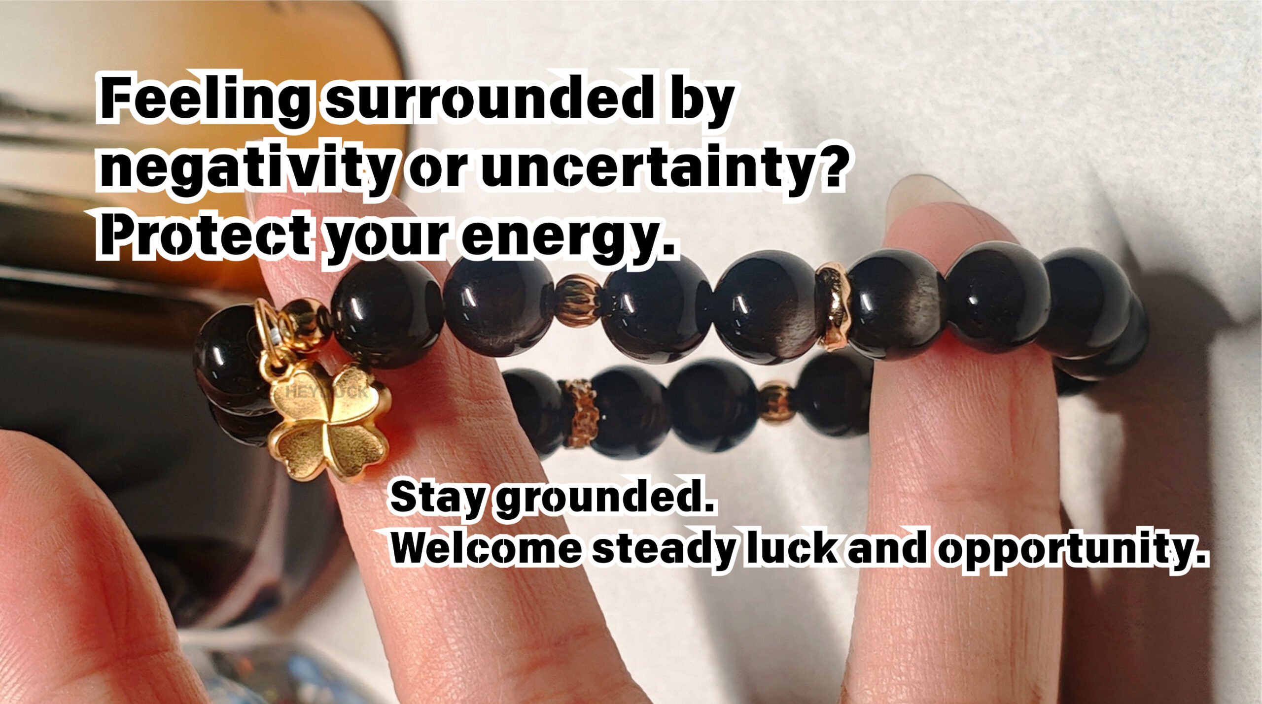 Silver Obsidian and four-leaf clover bracelet designed for protection, steady luck, and positive energy