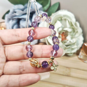 Natural amethyst and azeztulite bracelet symbolizing inner stillness, spiritual awakening, and emotional balance.