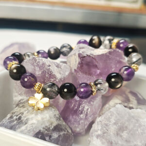 Display view of the Four-Leaf Clover Protection Bracelet with natural gemstone beads and a four-leaf clover charm