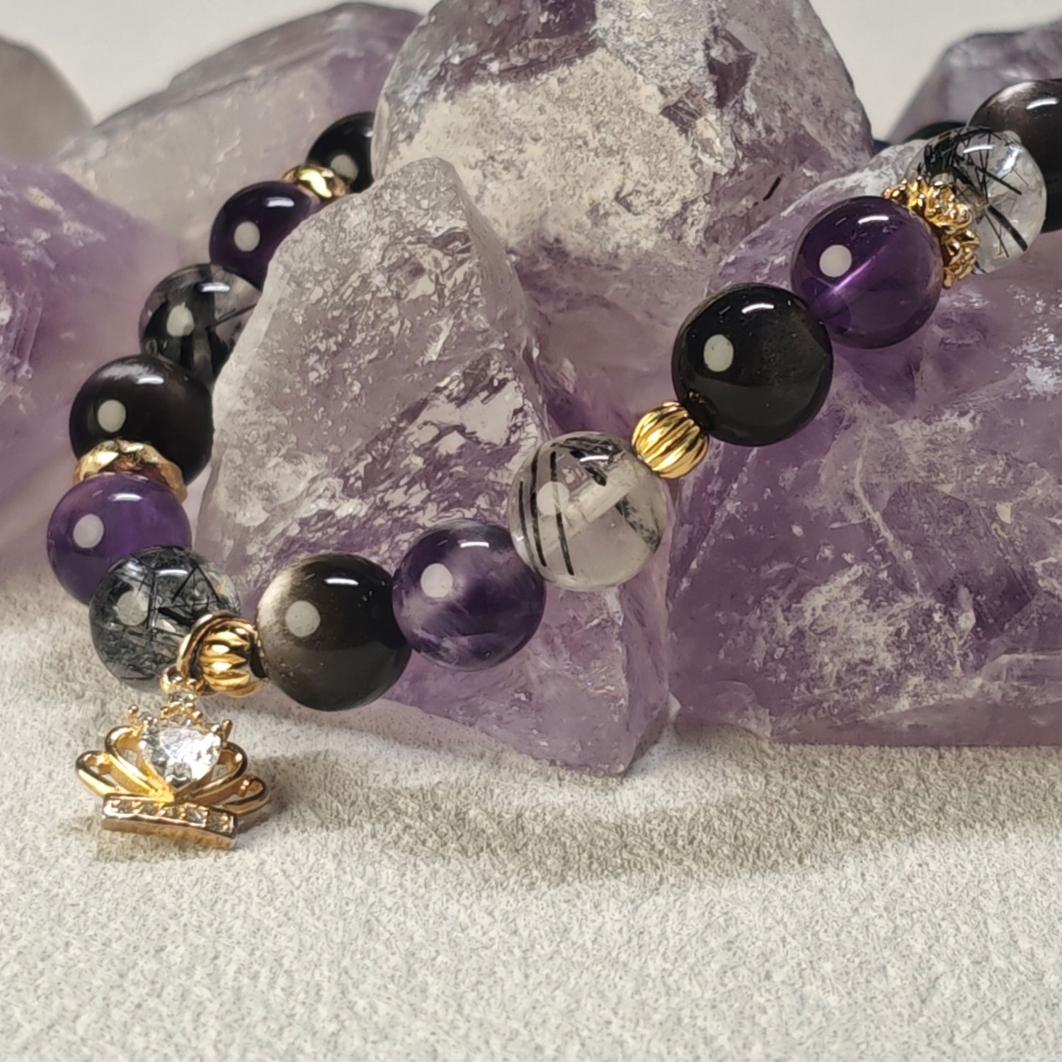 Handmade crown feather guardian bracelet crafted with attention to detail and natural crystals