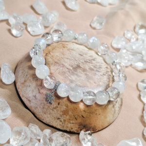 Moonstone and Clear Quartz Snowflake bracelet inspired by moonlight and winter snow symbolizing clarity, love, and emotional harmony