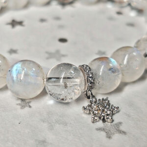 Close-up of Moonstone beads and Ice-Crack Clear Quartz crystal beads showing natural texture and clarity
