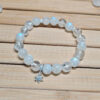Moonstone and Clear Quartz bracelet with Snowflake charm – LunarFrost CL main product view