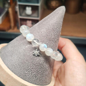 Snowflake charm display on Moonstone and Clear Quartz bracelet – LunarFrost CL product showcase detail