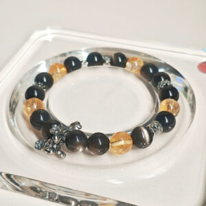 Natural Silver Obsidian and Golden Ice Quartz bracelet handcrafted for prosperity, balance, and positive energy
