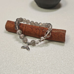 Gray moonstone and clear quartz bracelet representing moonlit ocean energy, emotional balance, and peaceful inner renewal