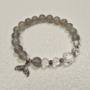 Gray Moonstone Tide Bracelet with clear quartz and sterling silver mermaid tail charm, inspired by moonlight, calm protection, and gentle transformation