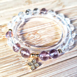 Ice Lavender Quartz and Clear Quartz bracelet with four-leaf clover charm symbolizing clarity and luck
