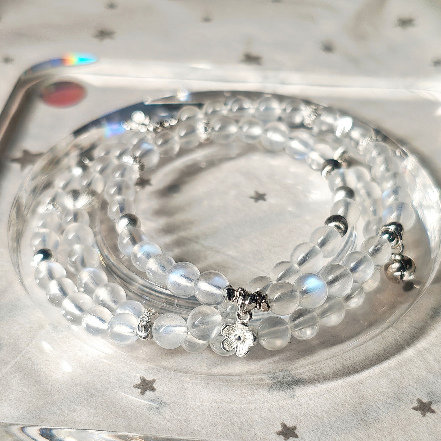Elegant Blue Moonstone layered wrap bracelet with luminous blue flash and minimalist 925 sterling silver accents.