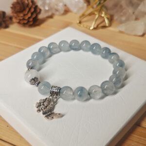 Natural Blue Rutilated Quartz bracelet featuring White Phantom Quartz, handcrafted to inspire confidence, clarity, and everyday focus.