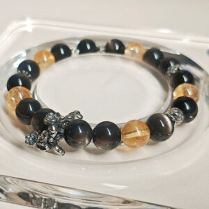 Handmade prosperity crystal bracelet symbolizing abundance, emotional balance, and steady personal growth