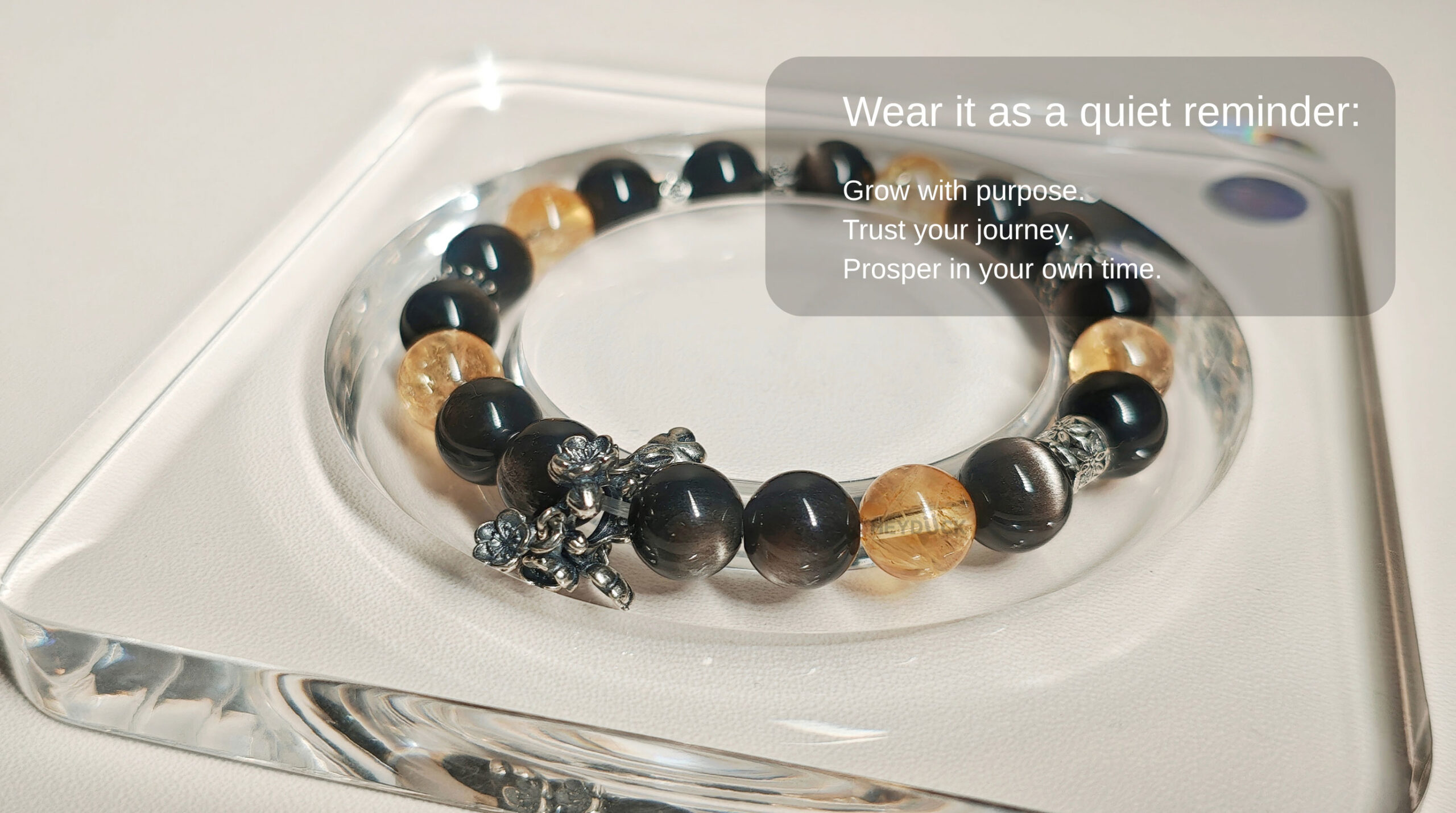 Handcrafted Silver Obsidian Prosperity Bracelet reminding you to grow with purpose, trust your journey, and embrace lasting prosperity