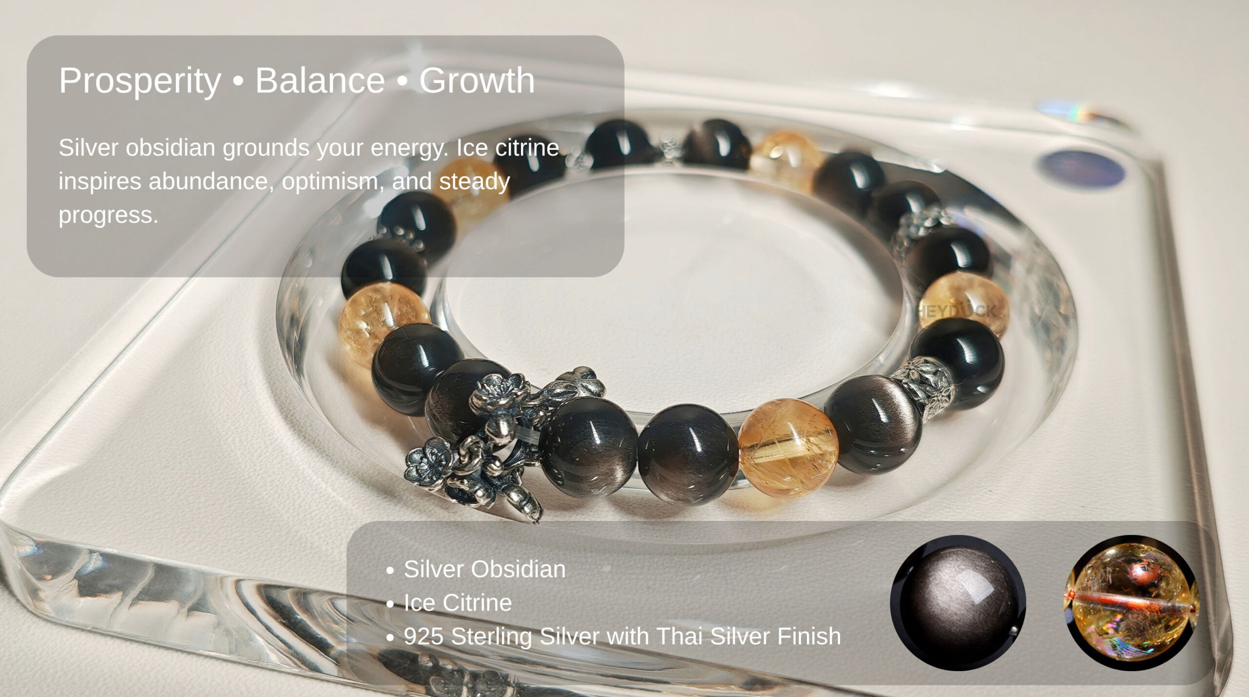 Handcrafted Silver Obsidian and Golden Ice Quartz bracelet supporting prosperity, balance, optimism, and steady growth