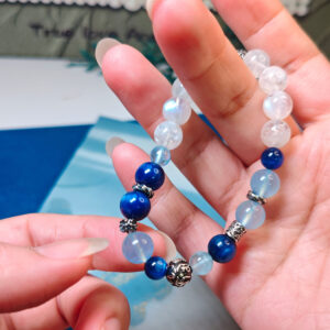 Crystal bracelet for calm expression and quiet confidence featuring Aquamarine, Kyanite, and Moonstone