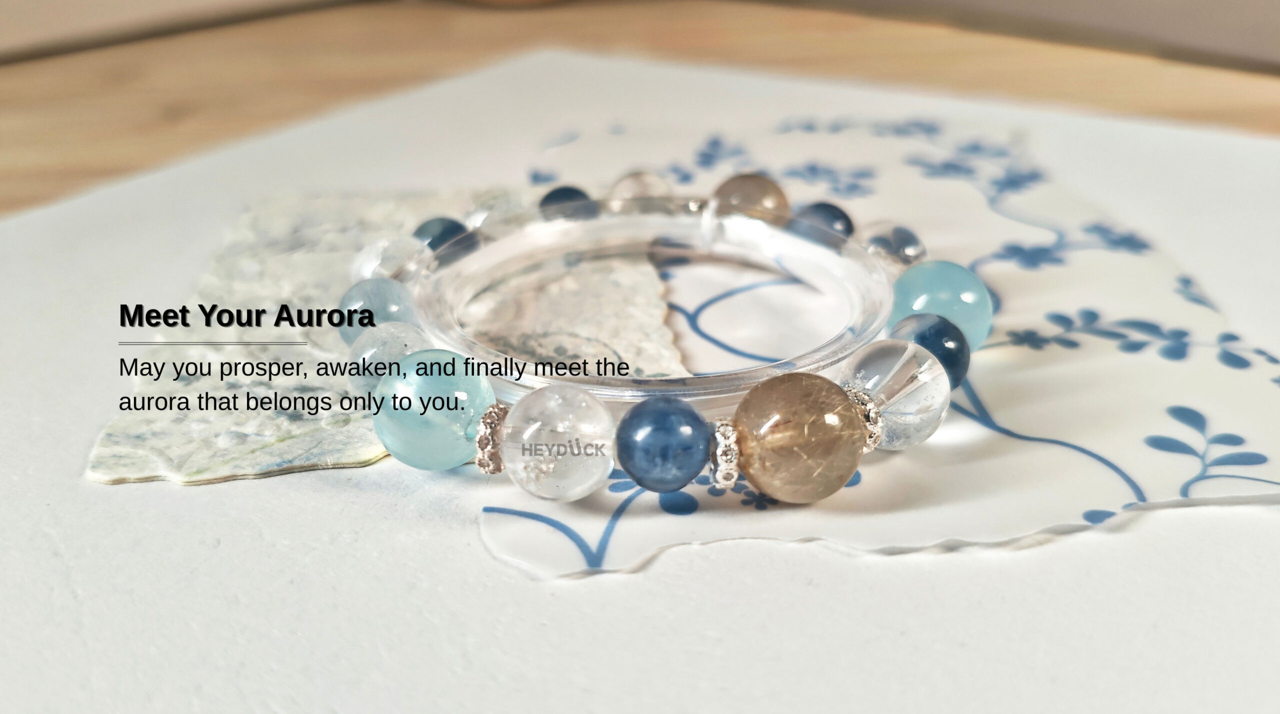 AuroraGain CL crystal bracelet with a meaningful blessing about prosperity, awakening, and finding your inner light