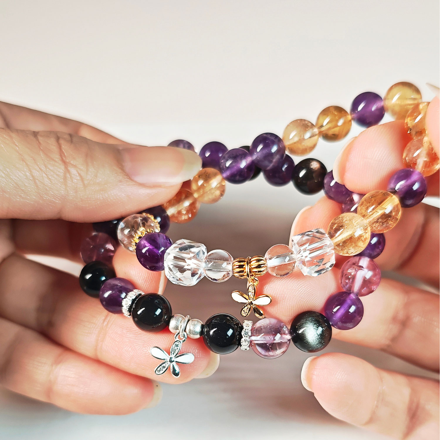 GoldBloom CL bracelet featuring a delicate 925 sterling silver gold plated flower charm and crystal beads