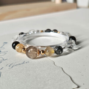 Golden Aegis Crystal Bracelet with golden and black crystal beads