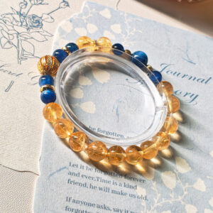 Ice Citrine bracelet design showcasing balanced crystal colors, blue kyanite beads, and 925 sterling silver gold-plated accents.