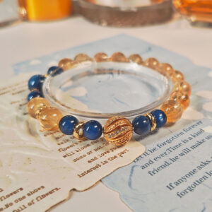 Ice Citrine Golden Horizon Bracelet from GiltWealth CL featuring natural ice citrine beads, blue kyanite accents, and gold-plated spacer beads.