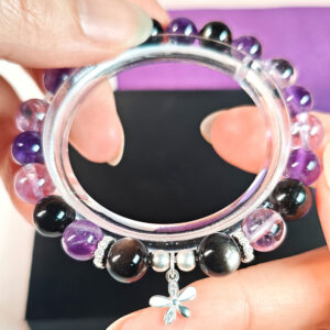 Midnight Bloom crystal bracelet for women with amethyst, silver obsidian, and lavender quartz designed for mindful living and personal balance.