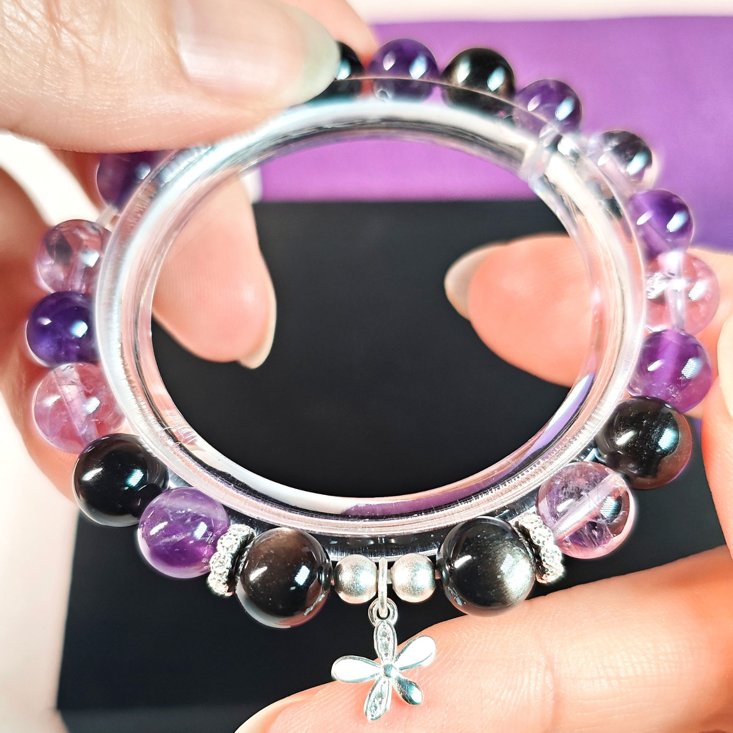 Midnight Bloom crystal bracelet for women with amethyst, silver obsidian, and lavender quartz designed for mindful living and personal balance.