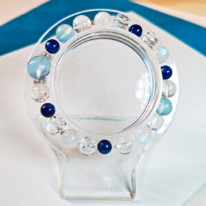 Ocean inspired blue crystal bracelet for women, symbolizing calm expression, clear thinking, and inner composure.