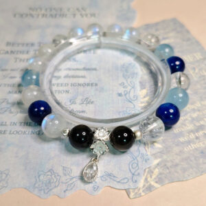 Aquamarine, deep blue kyanite, moonstone, and silver obsidian crystal bracelet