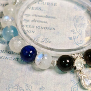 Detailed view of natural crystal beads and platinum-plated 925 sterling silver details on ShieldClarity CL