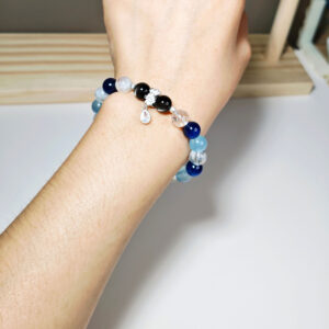 ShieldClarity crystal bracelet worn on a woman's wrist for calm protection, clarity, and confident everyday expression