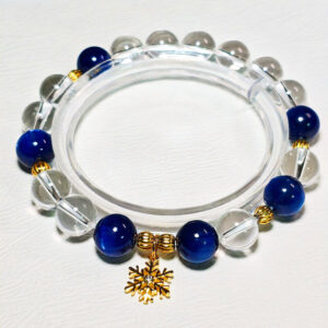 Crystal bracelet for clear communication featuring deep blue Kyanite, Clear Quartz, and a meaningful snowflake design