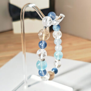 Veil Crystal Bracelet AuroraGain CL with gold rutilated quartz, blue kyanite, aquamarine, blue rutilated quartz, and ice clear quartz