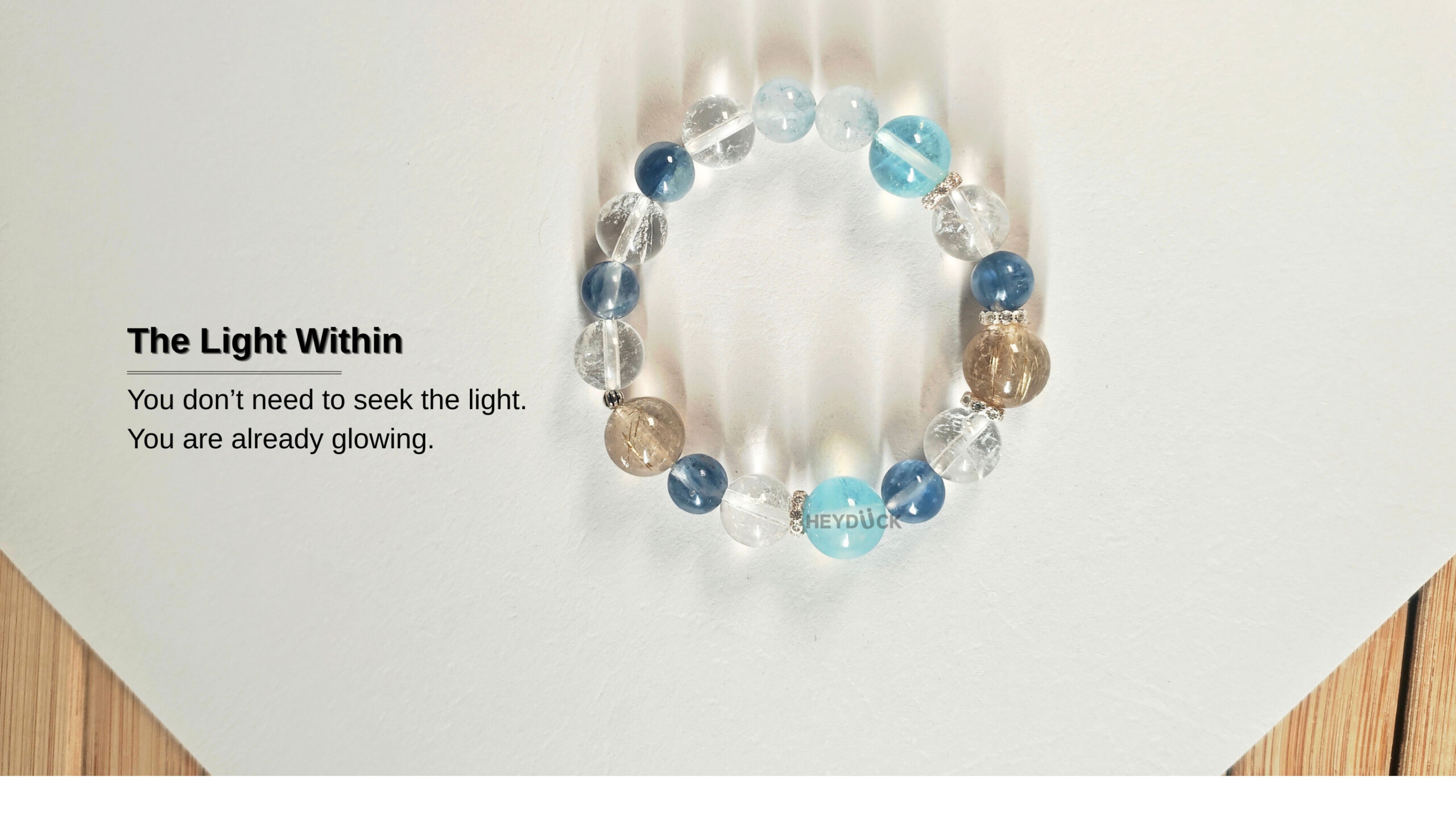 Veil Crystal Bracelet AuroraGain CL representing inner light with gold, blue, and clear natural crystals