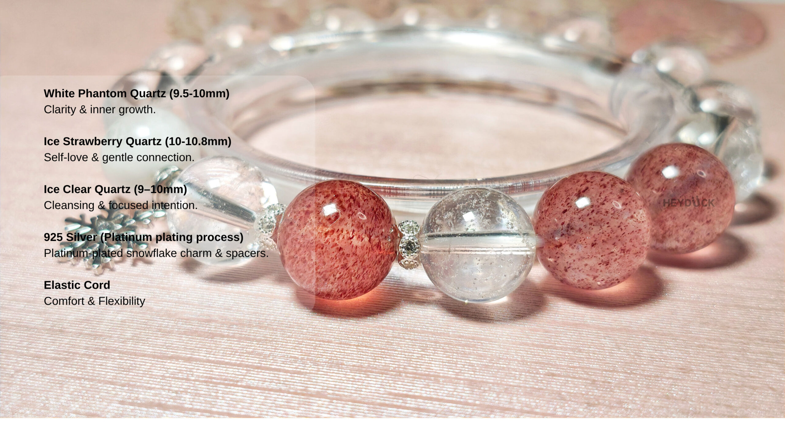White Phantom Quartz, Strawberry Quartz, Ice Clear Quartz, and 925 sterling silver platinum-plated snowflake charm used in the bracelet
