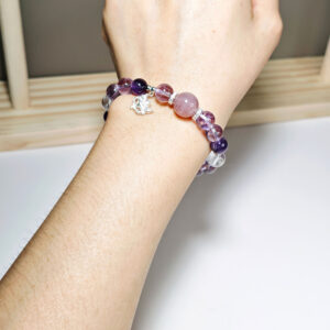 WiseBloom CL crystal bracelet worn on a woman's wrist, designed for intuitive and mindful everyday wear