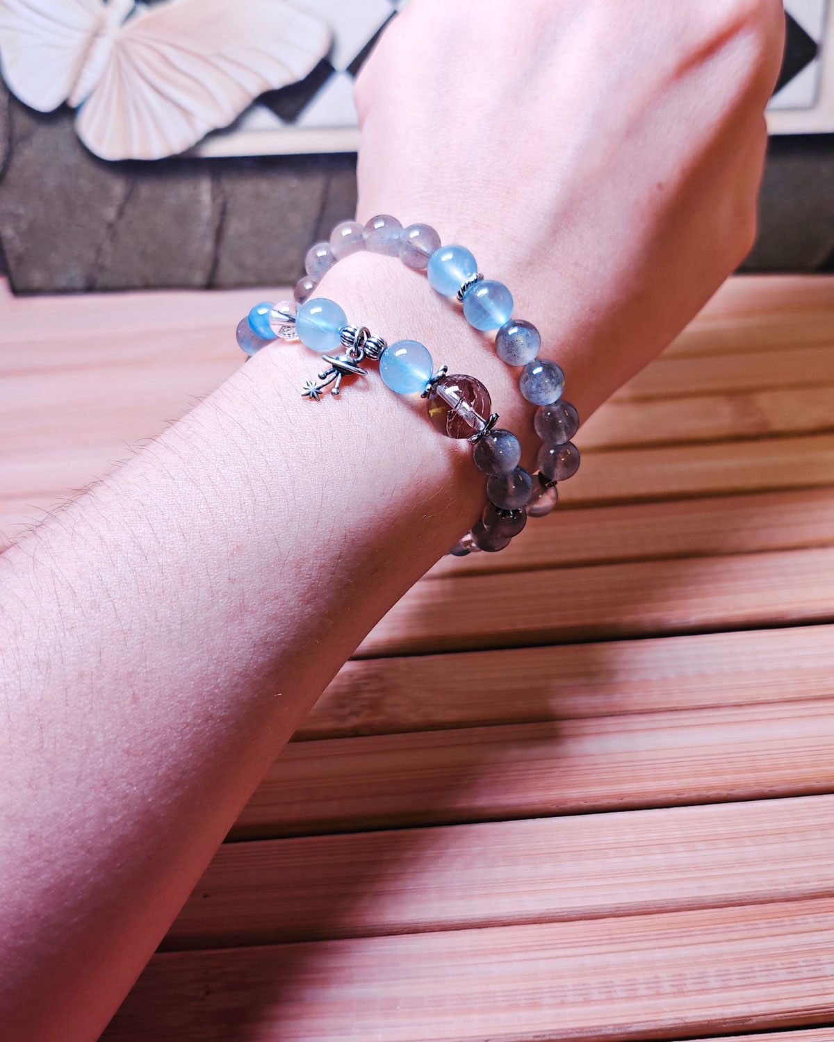 Woman wearing the Career Orbit crystal bracelet by HEYDUCK