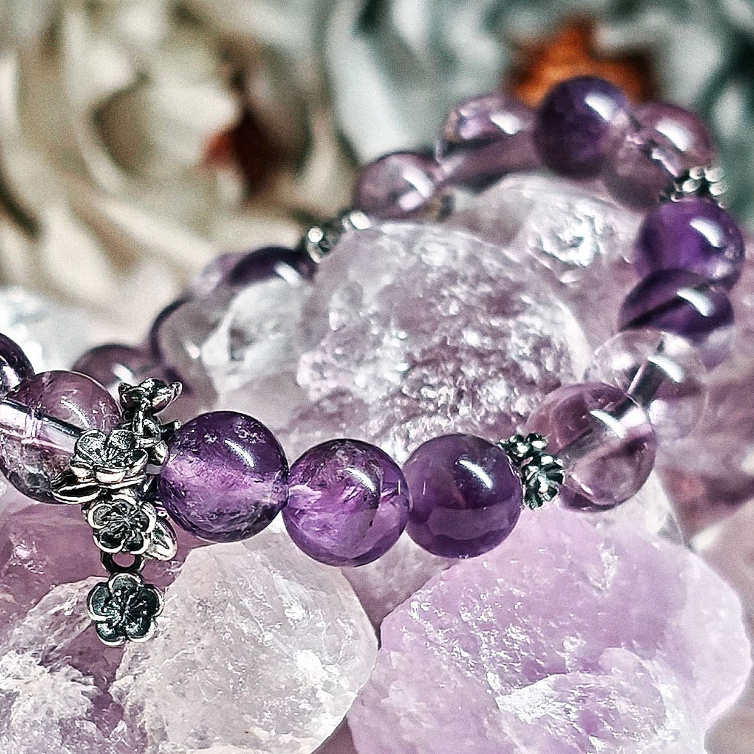 Angled view of amethyst bracelet highlighting crystal clarity