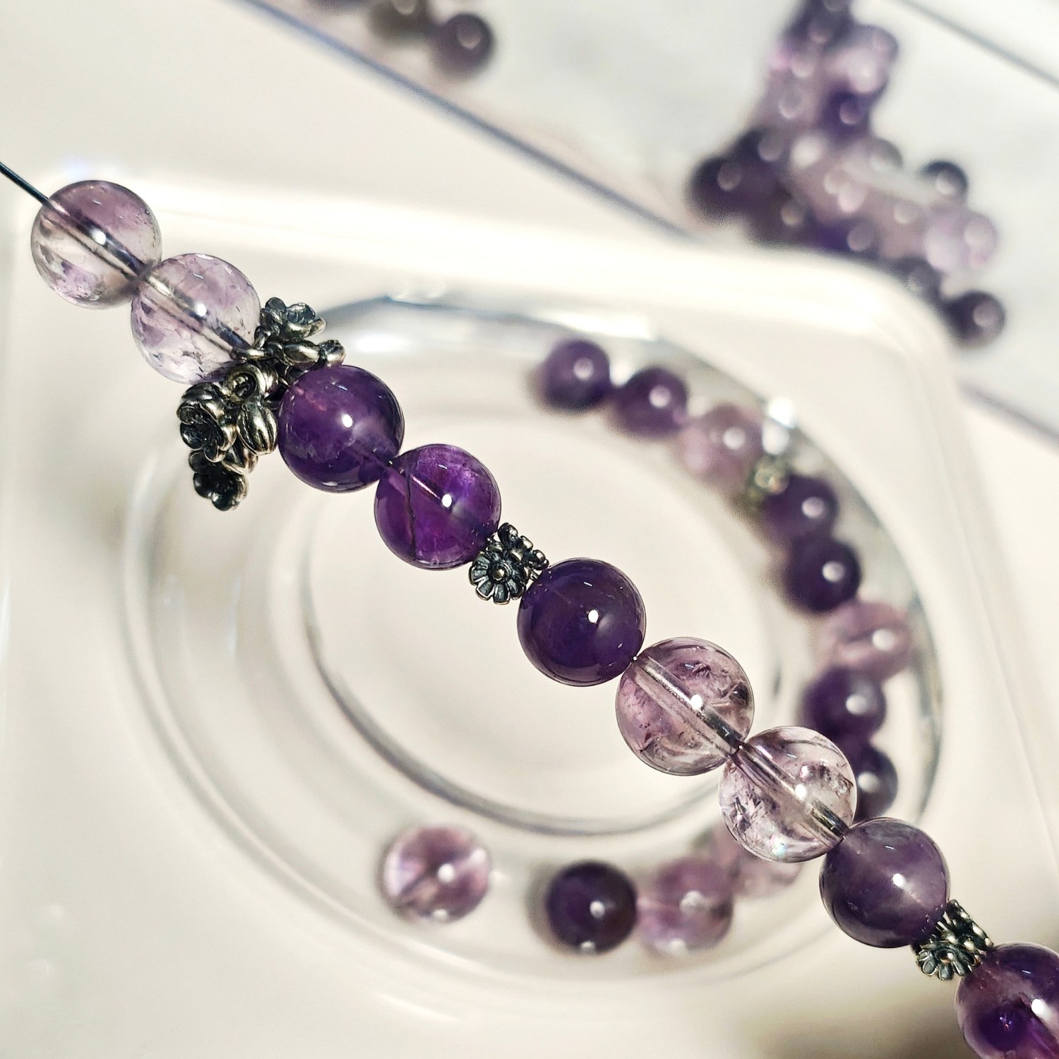 Amethyst bracelet worn on wrist showing elegant purple color