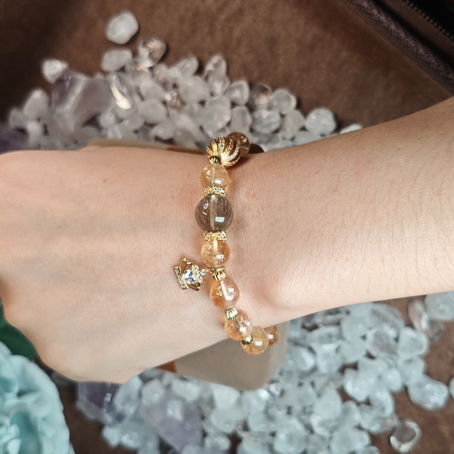 Wearing image showing golden rutilated quartz and citrine bracelet on wrist
